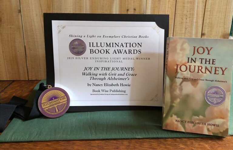 Illumination author Nancy Howie's medal, certificate, and award-winning book